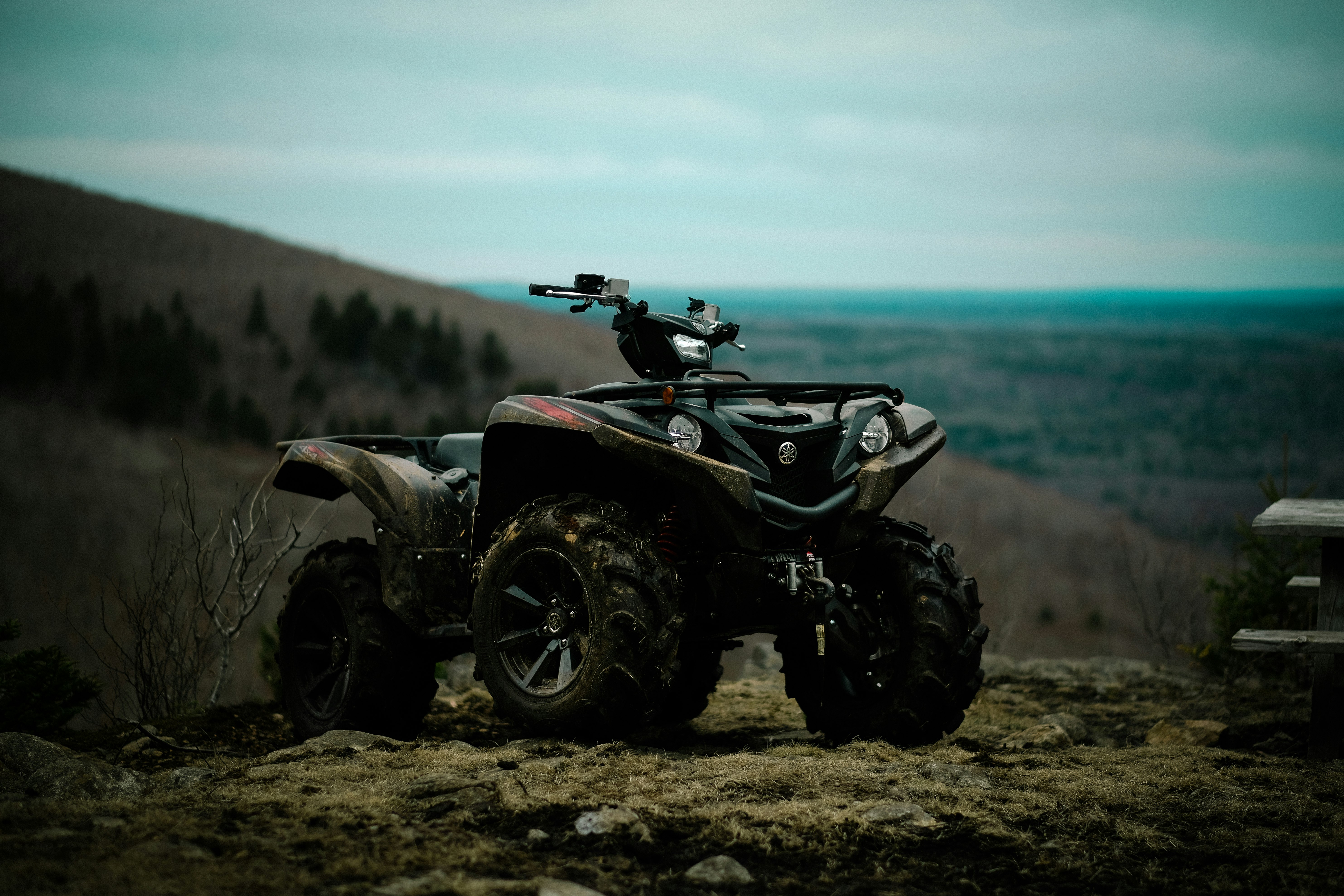 ATV parked on soil ground during day